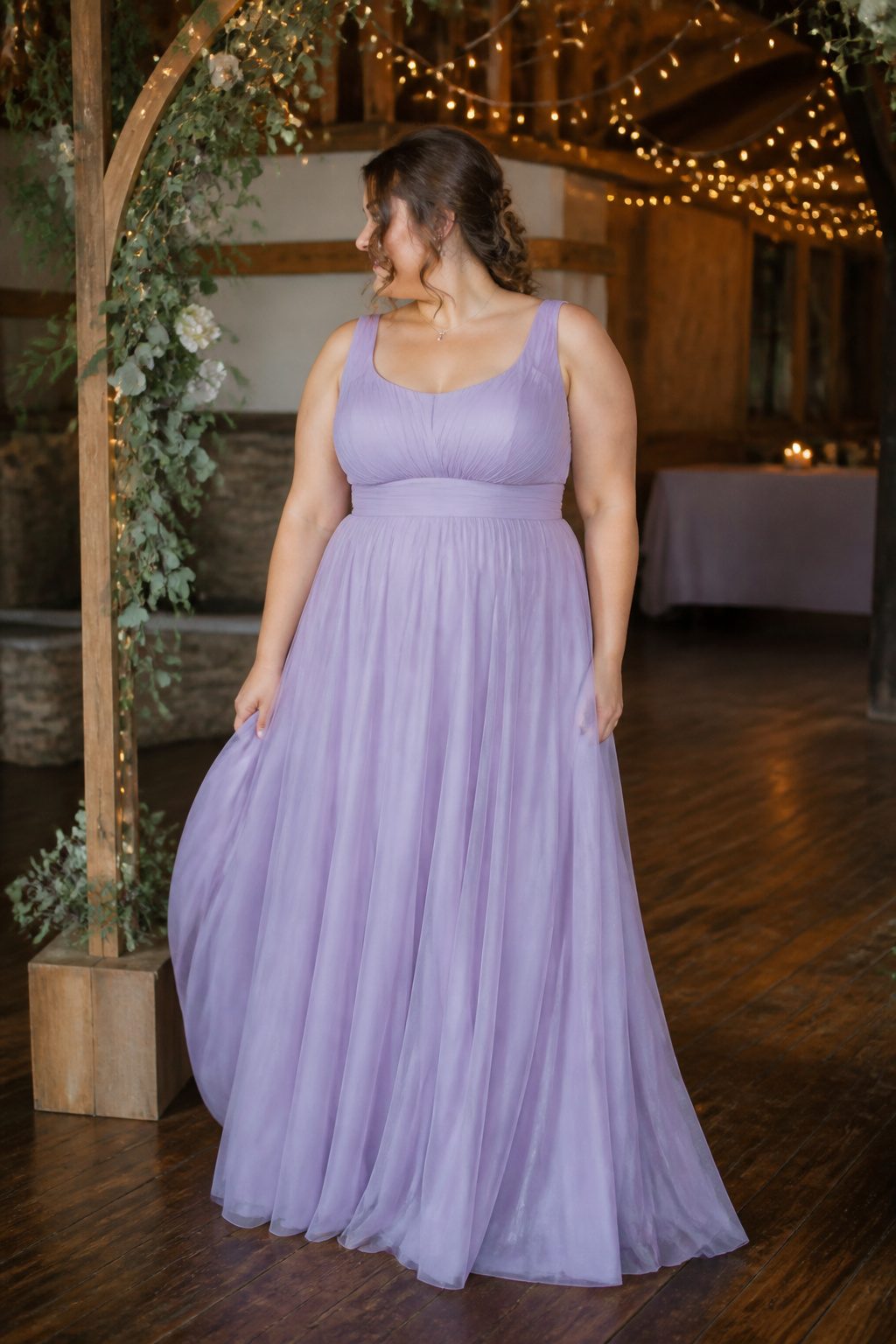 A scoop neck plus-size prom dress in soft lavender.